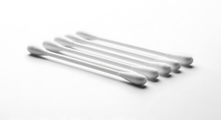 Close-up of Cotton Swabs on White Background for Hygiene.