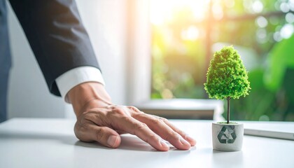 Obraz premium Sustainability Business Strategy Concept with Human Hand and Eco Planning