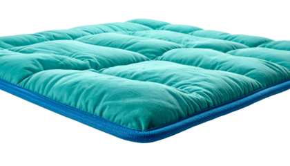 A close-up of a square teal cushion with a stitched grid pattern and a blue border