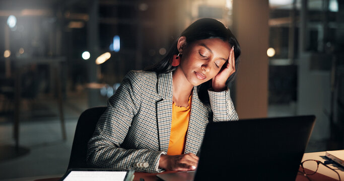 Night, woman and sleeping at laptop in office with article burnout, mental fatigue and brain fog. Tech, tired journalist and nap at publishing agency with low energy, resting and overworked on blog