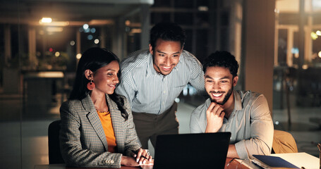 Laptop, feedback and business people in office at night with creative project in collaboration....