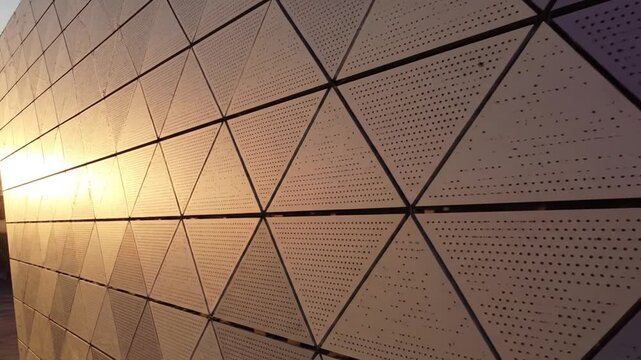 Sunlit geometric facade detail.