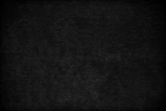 black paper texture background. blank black paper sheet.