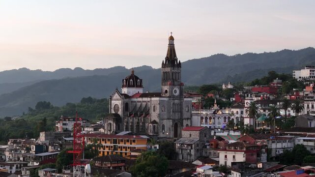 Hilltop church in latin small town of Cuetzalan, Aerial view at sunrise