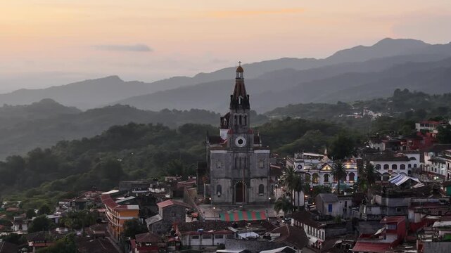 Colonial church of Jarritos in Cuetzalan at sunset in Puebla, Mexico. Aerial