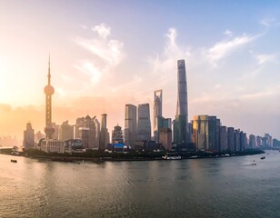 Obraz premium Skyline view with a river in the foreground and tall skyscrapers in the city during daytime