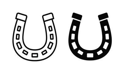 Fototapeta premium Two horseshoes in black and white on for luck and symbol