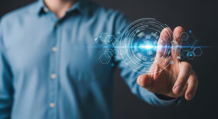 A man in a blue shirt interacting with a futuristic digital interface