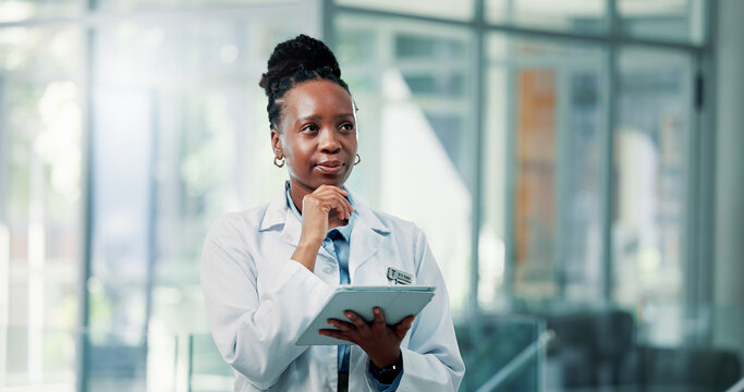 Black woman, doctor and thinking with tablet in lobby, review and insight with report at clinic. African person, medical professional and perspective with tech, application or telehealth at hospital