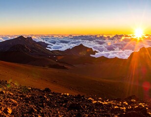 Sunrise over a volcanic landscape, with a sea of clouds and mountains silhouetted against the bright light