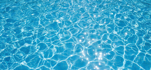 Clear Blue Swimming Pool Water Surface Texture with Sunlight Ripples