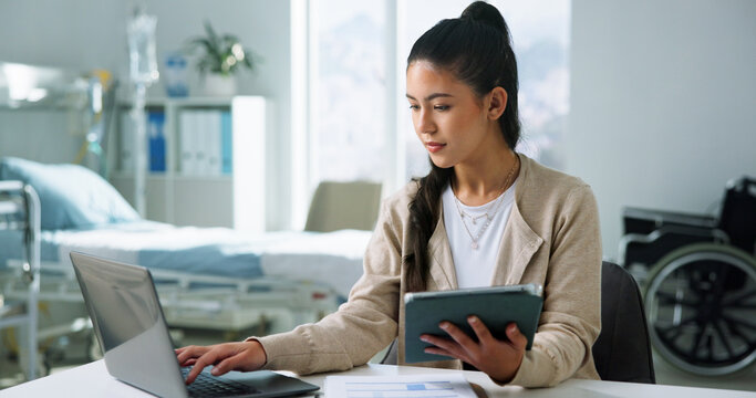 Administration, laptop and tablet with woman in hospital for medical files, doctor letter and research. Healthcare, surgery schedule and telehealth appointment with person in clinic for online admin