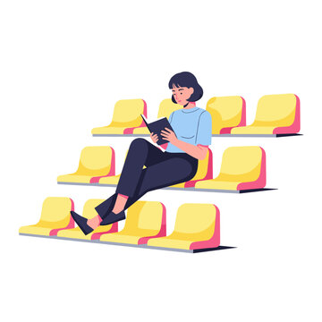 Young woman reading a book while sitting on colorful bleachers  
