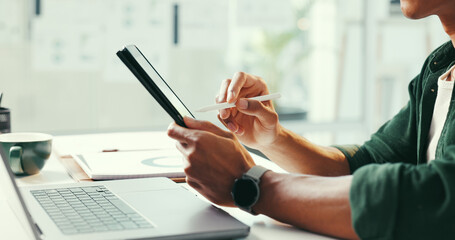Person, hands and writing in office with tablet, laptop and idea planning for web design company. Digital designer, man and creativity in workplace with tech, site testing and stylus for project. © peopleimages.com