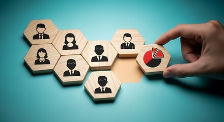 Human Hand Completing a Group of Hexagonal Blocks with a Pie Chart Icon for Team Analytics and Demographic Representation.