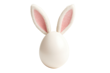 White egg with pink inner ears resembling a bunny head against a plain background high-key lighting with cutout object