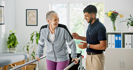 Fototapeta premium Man, elderly patient or physiotherapist with walker rail for balance or stability in clinic. Senior, male person or health physio with assistance or help for muscle recovery or movement in practice