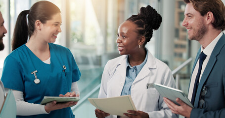 Fototapeta premium Businessman, doctors and nurse with meeting in clinic for surgery funding, action plan or feedback. Medical chart, people and team with tech for resource allocation, hospital management and planning