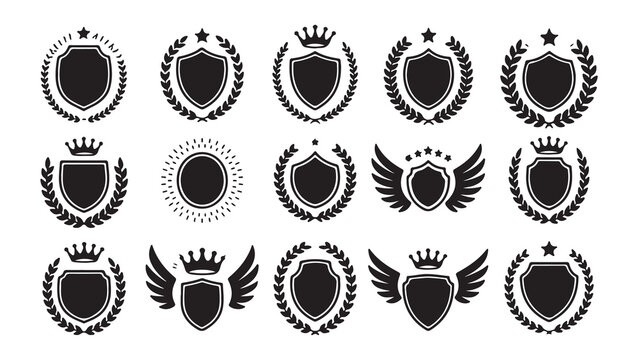 Set of black silhouette shields with crowns and laurel wreaths heraldry elements isolated on white