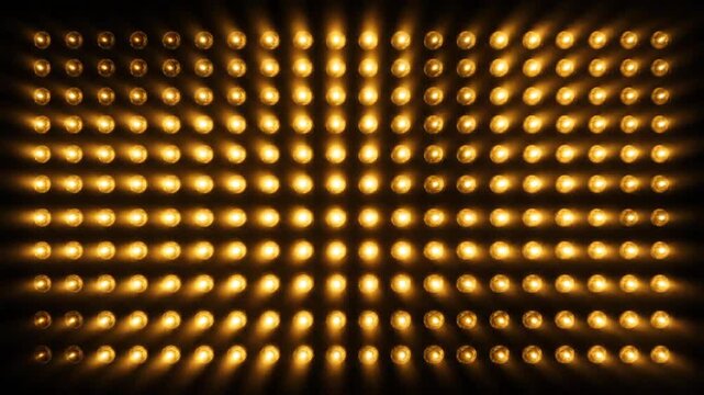A grid of golden lights on a black background, creating a mesmerizing pattern of illumination and shadow.