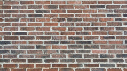 Obraz premium red clay brick wall background 