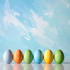 Row of colorful Easter eggs against an abstract blue and white sky, reflecting in shiny surface