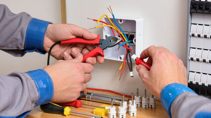 electrician working with electrical wires
