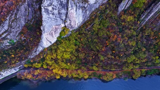 Top view down of the steep cliffs on the shores of Lake Iseo, Italy.