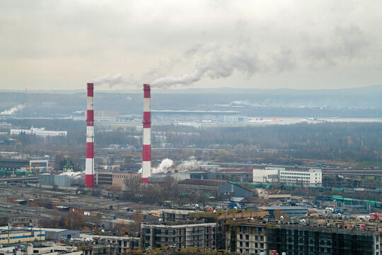 Urban landscape showing pollution and ecological impact.