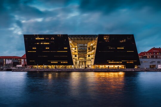 Night View Of The Black Diamond (Den Sorte Diamant) Royal Library At Blue Hour, Copenhagen, Denmark