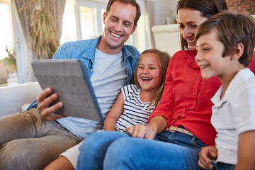 Laugh, family and children on sofa with tablet, smile and bonding together with online...