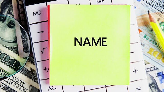 A magnifying glass meticulously examines American Dollar banknotes, resting alongside a calculator and yellow sticky notes with text NAME