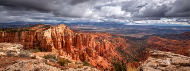 Dramatic Canyon Vista with Layered Rock Formations Under an Overcast Sky