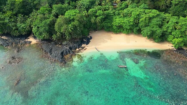 Aerial view from Margarida beach with the green forest at background. Ilha do Principe,S&atilde;o Tom&eacute;,Africa.
Drone shot backwards