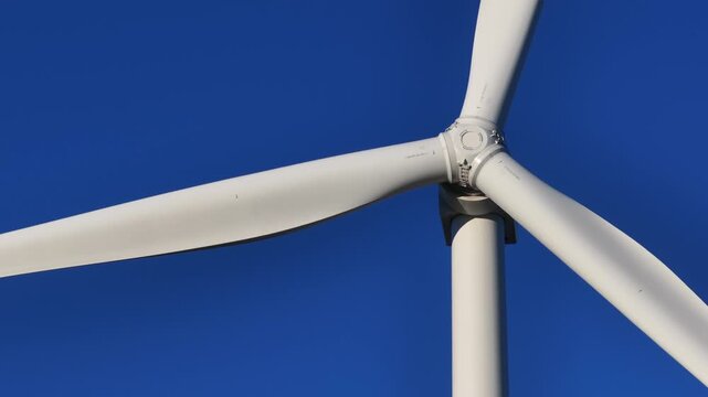 A wind turbine wind-powered electrical generators kinetic energy of wind into electrical energy network technology digital background connection