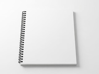 Blank spiral notebook on white background