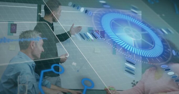 Business team at table, presenter initiating AR interface and colleagues tapping holographic rings