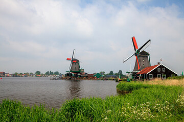 Naklejka premium Windmills near Dutch village
