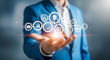 Businessman in a blue suit presents a glowing digital interface of gears and icons symbolizing business operations, strategy, and technological integration.