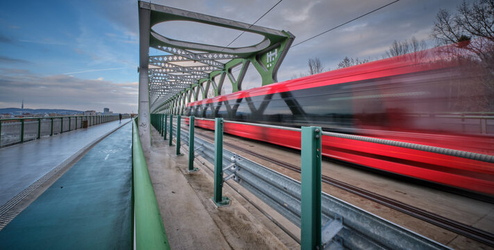 Fast and furious tram on the old bridge in Bratislava
