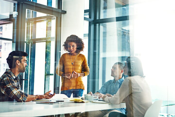 Glass, presentation and people in meeting, creative project and pitch for sales strategy Speaker, men and women in office, coworking and feedback for proposal, conversation or PR agency with planning