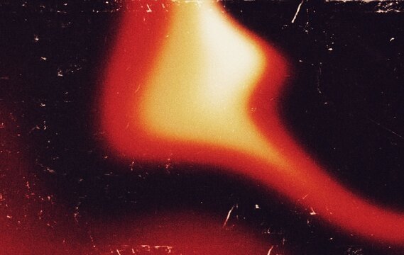 Vibrant light leaks noisy scratches dust film grain texture for photography edits. Grainy film burn or film overlay effect background. Warm multicolour light leaks glowing noisy scratches overlay.