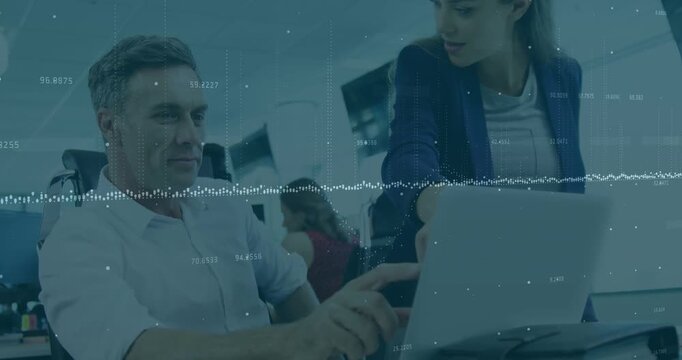 This video shows executives discussing the stock market over a laptop in an office