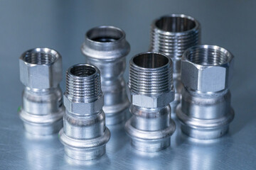 Stainless steel press fitting with thread for hose and pipe