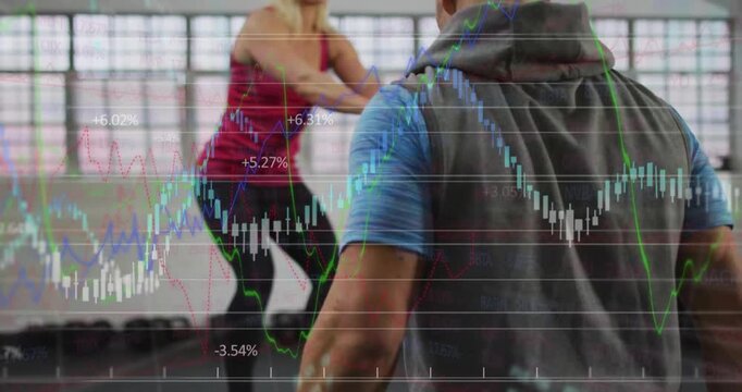 Trainer signaling client executing box jumping then ground plyometric jumping for fitness power