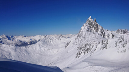 Spectacular view of snow capped Rocky Mountains in British Columbia on sunny day