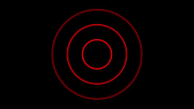 Concentric red circles with glowing effect on black