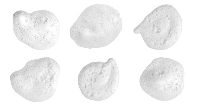 White cleansing foam bubbles isolated on white background, soft airy texture of soap lather for skincare, beauty, hygiene, cosmetic branding, minimal clean concept and product mockup design.