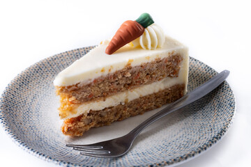 Carrot cake slice with cream cheese frosting isolated on white background