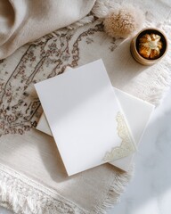 An elegant blank greeting card with gold foil edges on a Cloud Dancer white background. 
